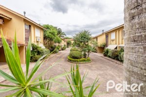 Casa em Condomínio à venda com 160m², 3 dormitórios, 1 suíte, 2 vagas, no bairro Tristeza em PORTO ALEGRE