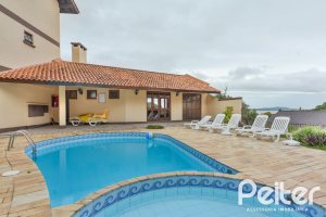 Casa em Condomínio à venda com 139m², 3 dormitórios, 1 suíte, 3 vagas, no bairro Tristeza em PORTO ALEGRE