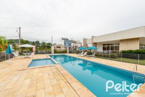 Casa em Condomínio à venda com 150m², 3 dormitórios, 1 suíte, 2 vagas, no bairro Hípica em PORTO ALEGRE