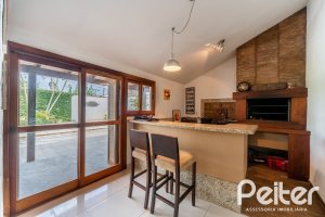 Casa à venda com 290m², 3 dormitórios, 3 suítes, 3 vagas, no bairro Ipanema em Porto Alegre