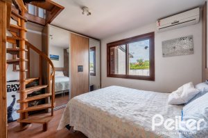 Casa à venda com 290m², 3 dormitórios, 3 suítes, 3 vagas, no bairro Ipanema em Porto Alegre