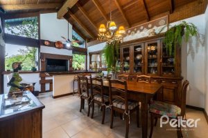 Casa em Condomínio à venda com 232m², 4 dormitórios, 1 suíte, 4 vagas, no bairro Terra Ville em PORTO ALEGRE