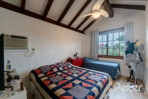 Casa em Condomínio à venda com 232m², 4 dormitórios, 1 suíte, 4 vagas, no bairro Terra Ville em PORTO ALEGRE