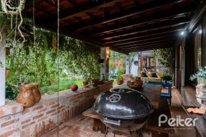 Casa em Condomínio à venda com 232m², 4 dormitórios, 1 suíte, 4 vagas, no bairro Terra Ville em PORTO ALEGRE