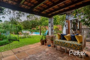 Casa em Condomínio à venda com 232m², 4 dormitórios, 1 suíte, 4 vagas, no bairro Terra Ville em PORTO ALEGRE