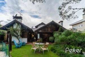 Casa em Condomínio à venda com 232m², 4 dormitórios, 1 suíte, 4 vagas, no bairro Terra Ville em PORTO ALEGRE