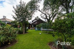 Casa em Condomínio à venda com 232m², 4 dormitórios, 1 suíte, 4 vagas, no bairro Terra Ville em PORTO ALEGRE