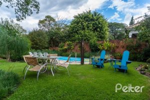 Casa em Condomínio à venda com 232m², 4 dormitórios, 1 suíte, 4 vagas, no bairro Terra Ville em PORTO ALEGRE