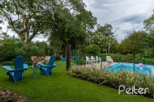 Casa em Condomínio à venda com 232m², 4 dormitórios, 1 suíte, 4 vagas, no bairro Terra Ville em PORTO ALEGRE