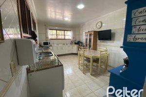 Casa à venda com 360m², 4 dormitórios, 4 suítes, 4 vagas, no bairro Tristeza em Porto Alegre