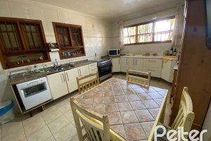 Casa à venda com 360m², 4 dormitórios, 4 suítes, 4 vagas, no bairro Tristeza em Porto Alegre