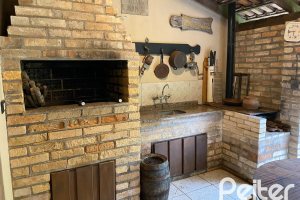 Casa à venda com 360m², 4 dormitórios, 4 suítes, 4 vagas, no bairro Tristeza em Porto Alegre