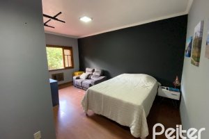 Casa à venda com 360m², 4 dormitórios, 4 suítes, 4 vagas, no bairro Tristeza em Porto Alegre
