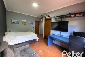 Casa à venda com 360m², 4 dormitórios, 4 suítes, 4 vagas, no bairro Tristeza em Porto Alegre