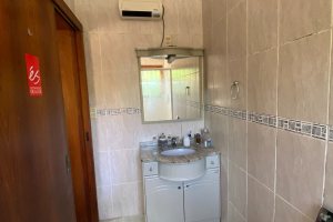 Casa à venda com 360m², 4 dormitórios, 4 suítes, 4 vagas, no bairro Tristeza em Porto Alegre