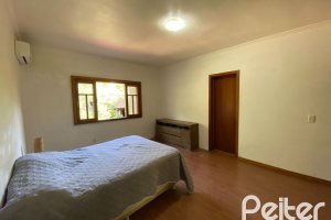 Casa à venda com 360m², 4 dormitórios, 4 suítes, 4 vagas, no bairro Tristeza em Porto Alegre