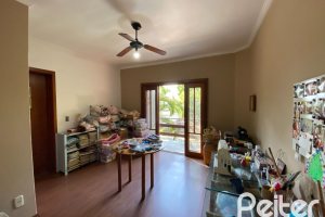 Casa à venda com 360m², 4 dormitórios, 4 suítes, 4 vagas, no bairro Tristeza em Porto Alegre