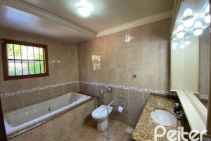 Casa à venda com 360m², 4 dormitórios, 4 suítes, 4 vagas, no bairro Tristeza em Porto Alegre