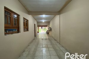 Casa à venda com 360m², 4 dormitórios, 4 suítes, 4 vagas, no bairro Tristeza em Porto Alegre