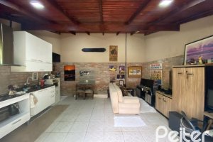 Casa à venda com 360m², 4 dormitórios, 4 suítes, 4 vagas, no bairro Tristeza em Porto Alegre