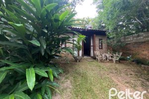 Casa à venda com 360m², 4 dormitórios, 4 suítes, 4 vagas, no bairro Tristeza em Porto Alegre