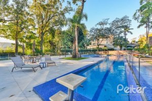 Casa em Condomínio à venda com 457m², 4 dormitórios, 4 suítes, 6 vagas, no bairro Pedra Redonda em PORTO ALEGRE