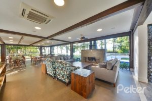 Casa em Condomínio à venda com 457m², 4 dormitórios, 4 suítes, 6 vagas, no bairro Pedra Redonda em PORTO ALEGRE