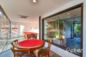 Casa em Condomínio à venda com 457m², 4 dormitórios, 4 suítes, 6 vagas, no bairro Pedra Redonda em PORTO ALEGRE