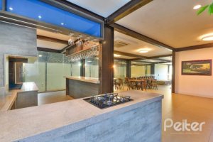 Casa em Condomínio à venda com 457m², 4 dormitórios, 4 suítes, 6 vagas, no bairro Pedra Redonda em PORTO ALEGRE