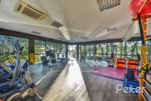 Casa em Condomínio à venda com 457m², 4 dormitórios, 4 suítes, 6 vagas, no bairro Pedra Redonda em PORTO ALEGRE