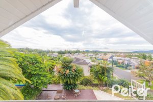 Casa em Condomínio à venda com 941m², 5 dormitórios, 5 suítes, 6 vagas, no bairro Terra Ville em PORTO ALEGRE