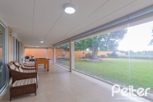 Casa em Condomínio à venda com 941m², 5 dormitórios, 5 suítes, 6 vagas, no bairro Terra Ville em PORTO ALEGRE