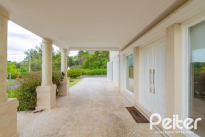 Casa em Condomínio à venda com 941m², 5 dormitórios, 5 suítes, 6 vagas, no bairro Terra Ville em PORTO ALEGRE