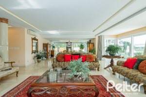 Casa em Condomínio à venda com 941m², 5 dormitórios, 5 suítes, 6 vagas, no bairro Terra Ville em PORTO ALEGRE
