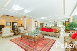 Casa em Condomínio à venda com 941m², 5 dormitórios, 5 suítes, 6 vagas, no bairro Terra Ville em PORTO ALEGRE