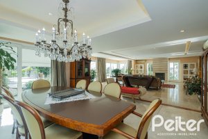 Casa em Condomínio à venda com 941m², 5 dormitórios, 5 suítes, 6 vagas, no bairro Terra Ville em PORTO ALEGRE