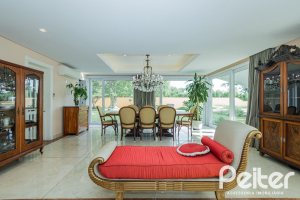 Casa em Condomínio à venda com 941m², 5 dormitórios, 5 suítes, 6 vagas, no bairro Terra Ville em PORTO ALEGRE