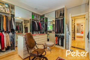 Casa em Condomínio à venda com 941m², 5 dormitórios, 5 suítes, 6 vagas, no bairro Terra Ville em PORTO ALEGRE