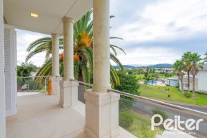 Casa em Condomínio à venda com 941m², 5 dormitórios, 5 suítes, 6 vagas, no bairro Terra Ville em PORTO ALEGRE