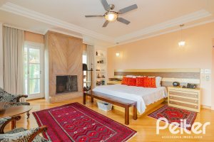 Casa em Condomínio à venda com 941m², 5 dormitórios, 5 suítes, 6 vagas, no bairro Terra Ville em PORTO ALEGRE