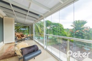 Casa em Condomínio à venda com 941m², 5 dormitórios, 5 suítes, 6 vagas, no bairro Terra Ville em PORTO ALEGRE