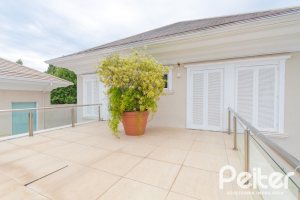 Casa em Condomínio à venda com 941m², 5 dormitórios, 5 suítes, 6 vagas, no bairro Terra Ville em PORTO ALEGRE