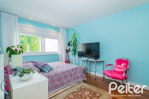 Casa em Condomínio à venda com 941m², 5 dormitórios, 5 suítes, 6 vagas, no bairro Terra Ville em PORTO ALEGRE