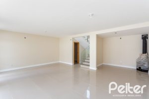 Casa em Condomínio à venda com 190m², 3 dormitórios, 1 suíte, 2 vagas, no bairro Vila Nova em PORTO ALEGRE