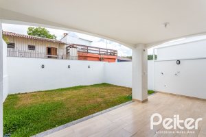 Casa em Condomínio à venda com 190m², 3 dormitórios, 1 suíte, 2 vagas, no bairro Vila Nova em PORTO ALEGRE
