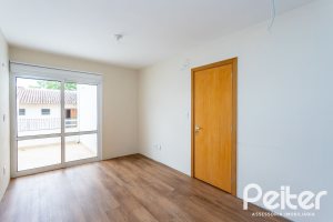 Casa em Condomínio à venda com 190m², 3 dormitórios, 1 suíte, 2 vagas, no bairro Vila Nova em PORTO ALEGRE