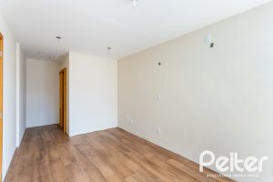 Casa em Condomínio à venda com 190m², 3 dormitórios, 1 suíte, 2 vagas, no bairro Vila Nova em PORTO ALEGRE