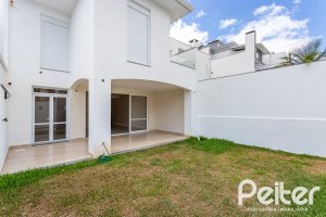 Casa em Condomínio à venda com 190m², 3 dormitórios, 1 suíte, 2 vagas, no bairro Vila Nova em PORTO ALEGRE