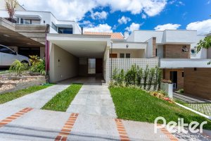 Casa em Condomínio à venda com 190m², 3 dormitórios, 1 suíte, 2 vagas, no bairro Vila Nova em PORTO ALEGRE