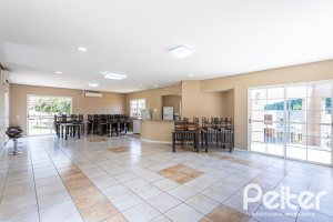 Casa em Condomínio à venda com 190m², 3 dormitórios, 1 suíte, 2 vagas, no bairro Vila Nova em PORTO ALEGRE